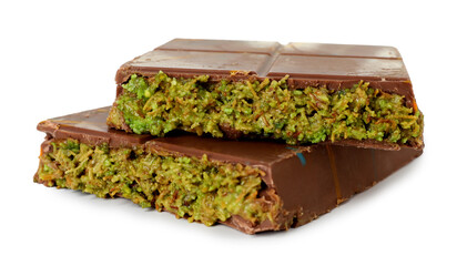 Pieces of Dubai chocolate bar with pistachio and knafeh isolated on white