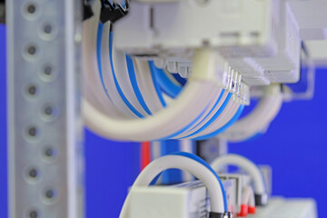 Connection of electrical modules using insulated copper electrical wires. Close-up. Soft focus.