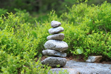 zen stones on the grass