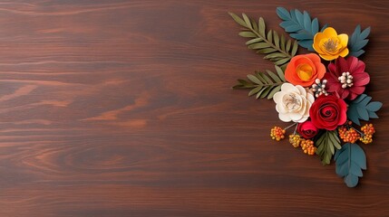 Obraz premium Floral Arrangement on Wood: A delicate and vibrant arrangement of colorful paper flowers blossoms gracefully on a rustic wooden backdrop, creating a charming and elegant composition.