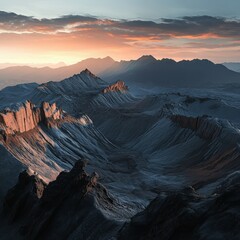 Obraz premium Scenic valley under a dramatic sunset in the mountains