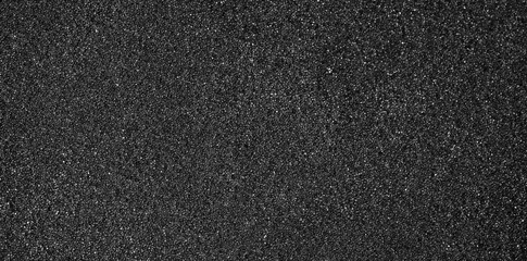 Black foam rubber texture background. Black foam surface, top view, flat lay backdrop. 