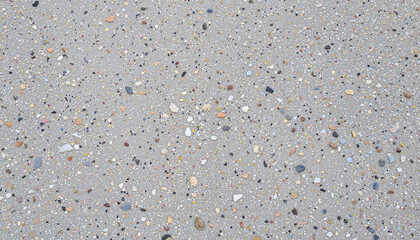 Textured gravel background with colorful pebbles