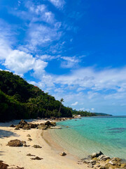 Secluded Tropical Beach with Crystal Clear Waters