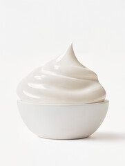 Swirled creamy dessert served in a white bowl against a plain backdrop
