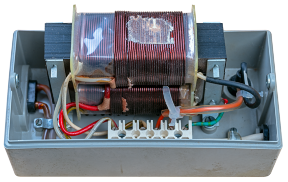 Inside of a small electrical transformer designed to power home appliances.