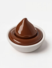 Creamy chocolate sauce in a bowl showcases rich texture and indulgent flavor perfect for desserts