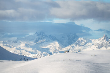 Kreuzjochspitze, Madaunspitze, and Riffelspitze of the Verwall Group in Tyrol and Vorarlberg. Below the peaks lies the Ski Arlberg resort, featuring fantastic and wide ski slopes.