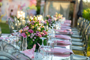 beautiful wedding table setting with flowers and candles