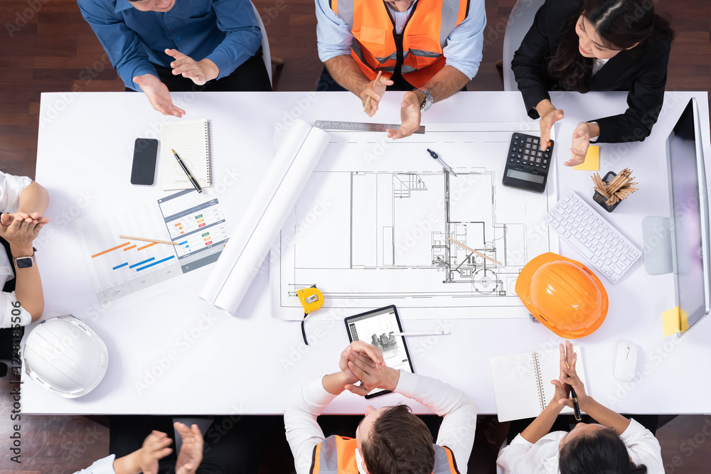 Poster Top view banner of diverse group of civil engineer and client working together on architectural project, reviewing construction plan and building blueprint at meeting table. Prudent