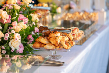 Table setting for a catered event meal for a birthday or event.