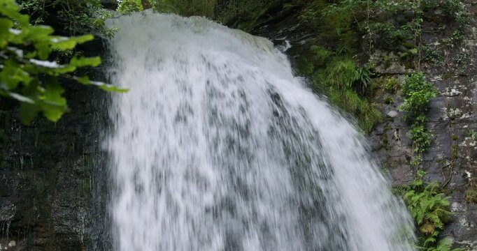 Mid shot of the top of Melin Court waterfall at Melin Court nature reserve