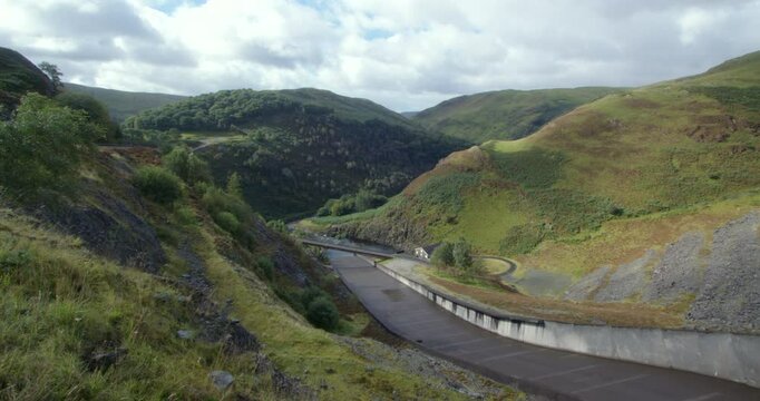 Extra wide shot of the hills and spillway at Llyn Brianne dam at Rhandirmwyn, Llandovery