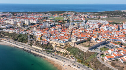 Fototapeta premium Aerial panorama of city of Sines, Alentejo Portugal Europe. Aerial view of old fishing port, historic center and castle. 
