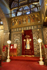 Interior of the Coptic Church of St. Sergius and St. Bacchus in Cairo Egypt showcasing Byzantine architecture and sacred atmosphere