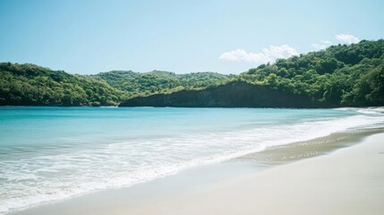 Serene Tropical Beach Scene With Lush Green Hills