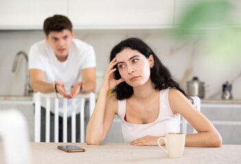 Young guy yells at girl for inappropriate behavior, family quarrel