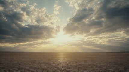 Sunset Over a Cracked Desert Landscape