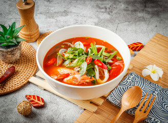 Thai Hot and Sour Pho served in bowl isolated on grey background side view of taiwan food