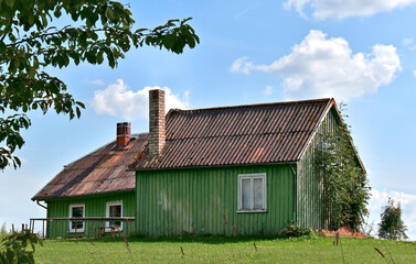 Obraz premium Typical country house, small colourful Scandinavian-style cottage, Lithuania