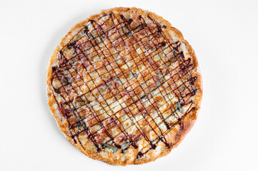 a tasty Italian pizza with mozzarella, sage, bacon and balsamic vinegar , isolated on white background