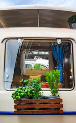 Vintage Camper with Herb Garden on Window