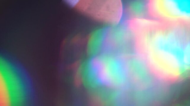 Iridescent light leaks and flares transitioning smoothly