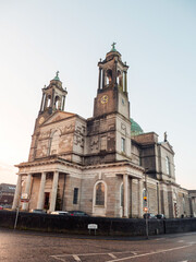 View on Church of Saints Peter and Paul at sunset. Warm color light. Popular old town, shopping, educational and industrial center. Tourist and travel hub. Famous landmark