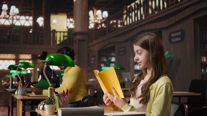 Rude woman answering a phone call in the library and disturbing people, being very noisy. Clients asking her to keep quiet, losing focus and concentration while learning or reading. Camera A.