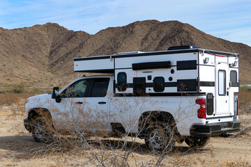 Pop-up Slide-in Truck Camper