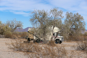 Stealth Camper Camping in the Desert Brush