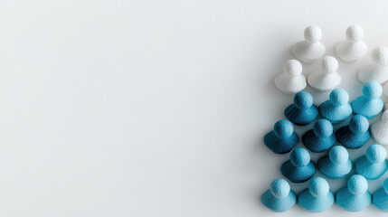 Colorful group of figurines arranged in pattern on white background, symbolizing teamwork and diversity