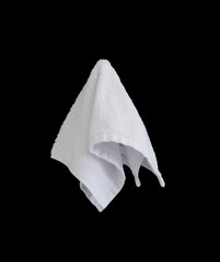 white face towel isolated on black background