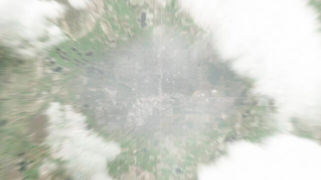Earth zoom in from space to Longmont, Colorado, USA. Followed by zoom out through clouds and atmosphere into space. Satellite view. Travel intro. Images from NASA