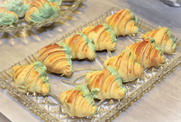 A plate of Croissant with Pistachio cream for cocktail