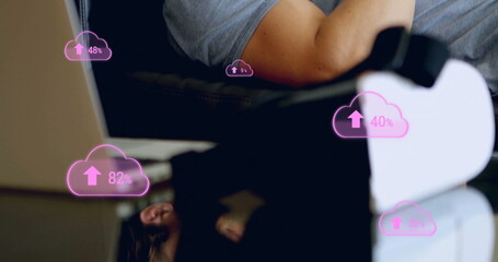 Image of clouds with growing numbers over caucasian man using smartphone