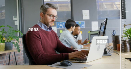 Image of financial data processing over diverse business people in office