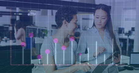 Image of diagrams over diverse female colleagues talking in office