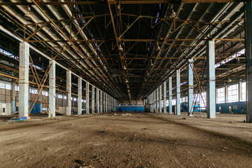 Old broken empty abandoned industrial building interior