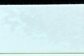 Light Blue Textured Background with Fine Horizontal Lines and Frayed Edges Creates a Subtle Pattern