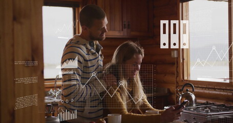Image of financial data processing over biracial couple in kitchen