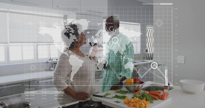 Image of financial data processing over biracial senior couple in kitchen
