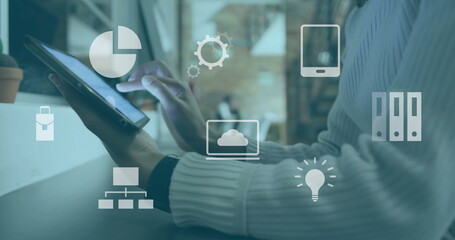 Image of financial data processing over caucasian businessman using tablet in office