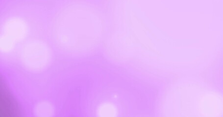 Image of glowing light spots moving over pink background