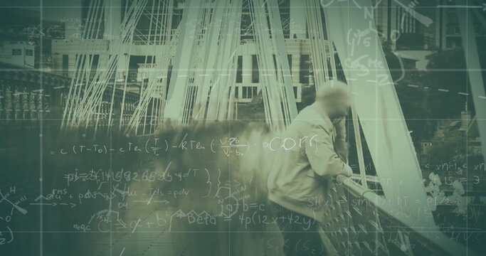 Image of mathematical equations over busy city