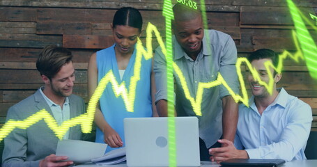 Image of financial data processing over diverse colleagues discussing work in office