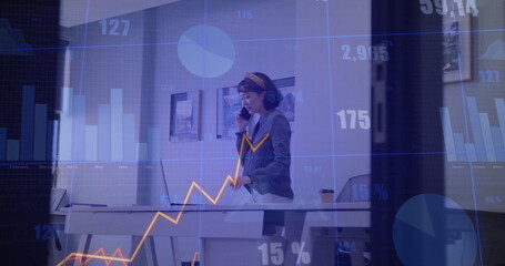 Image of financial data processing over asian businesswoman using smartphone in office