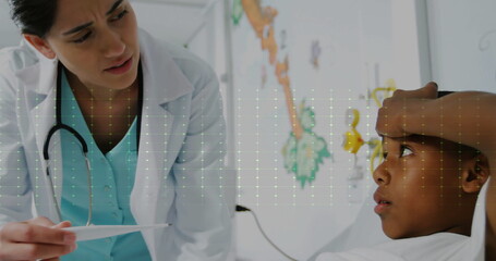 Image of cardiograph over diverse doctor and boy patient in hospital