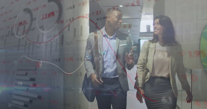 Image of financial data processing over diverse colleagues discussing work in office