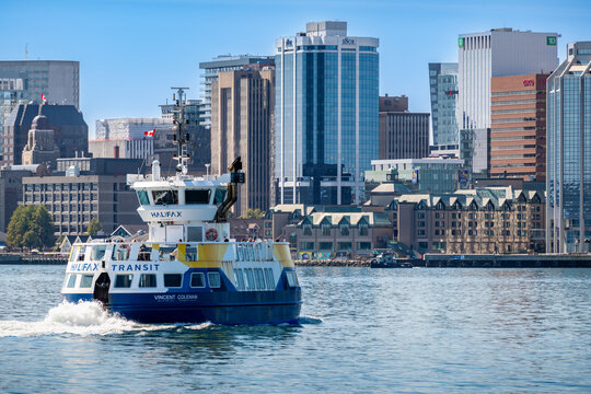 Halifax, Nova Scotia, Canada &ndash; August 30, 2024: Halifax Transit Ferry crossing the harbour to Dartmouth and Halifax downtown in the background